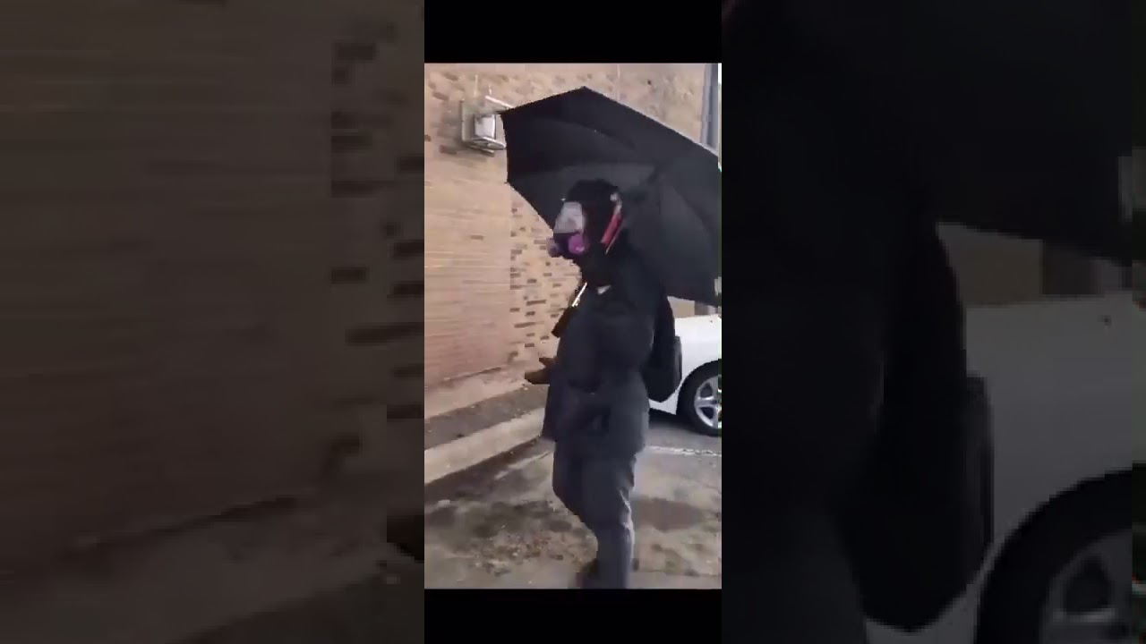 Minneapolis Umbrella Man (He's a Racist Biker)